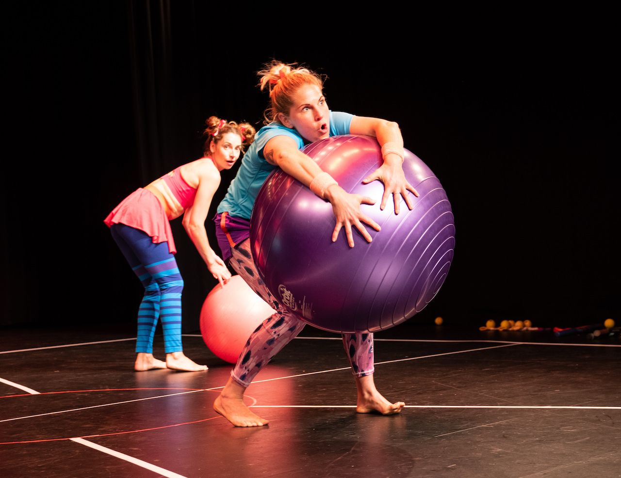 Promotional image of performers from  CATCH! by Maxima Circus happening at KPAC in March 2022