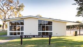 View of Cyril Road Hall from the side with hall signage