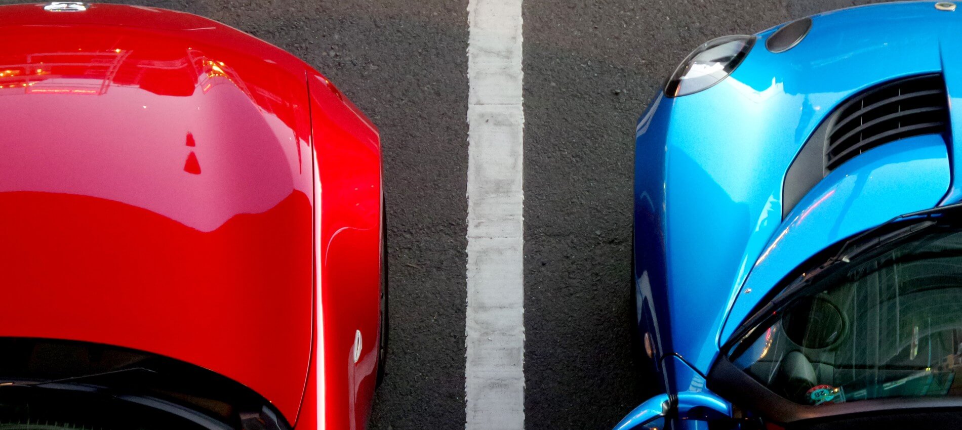 Aerial view of the front of two carks parked