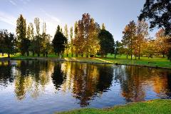 View of the lake at the start of autumn at Stirk Park located at Kalamunda