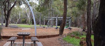 View of the picnic table located closest to the playground at Alan Anderson Park