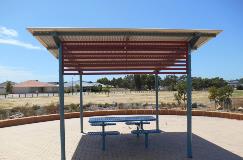 Some seating available at the Nature Playscape area located in Wattle Grove (The Promenade)