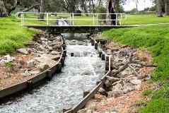 Footbridge over waterway at Woodlupine Brook