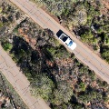 AerialviewofawhitevehicletravellingdowntheZigZagScenicDrive